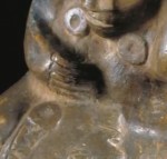 Right hand shows two and three with fingers.